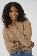 Lizza buttons pull toasted coconut