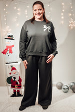 Elenora sweater black oyster bow