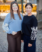 Mesa Mindy sweater zwart of lichtblauw