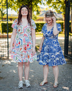 Sezen button dress kobalt of wit postcard