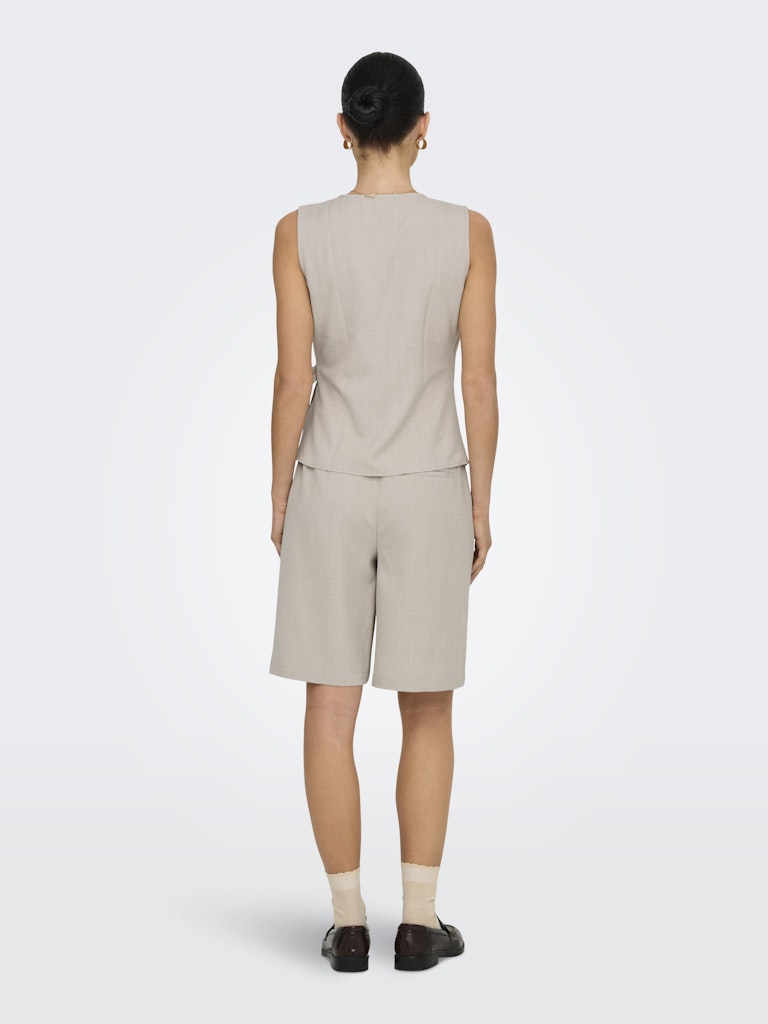 Nina wrap top zwart of beige