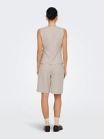 Nina wrap top zwart of beige