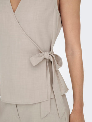 Nina wrap top zwart of beige