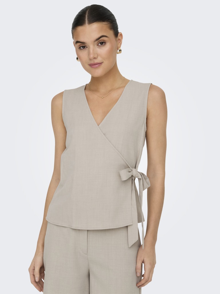 Nina wrap top zwart of beige