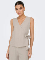 Nina wrap top zwart of beige